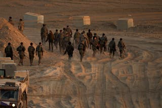 Israeli soldiers near the border, as seen on Friday from southern Israel